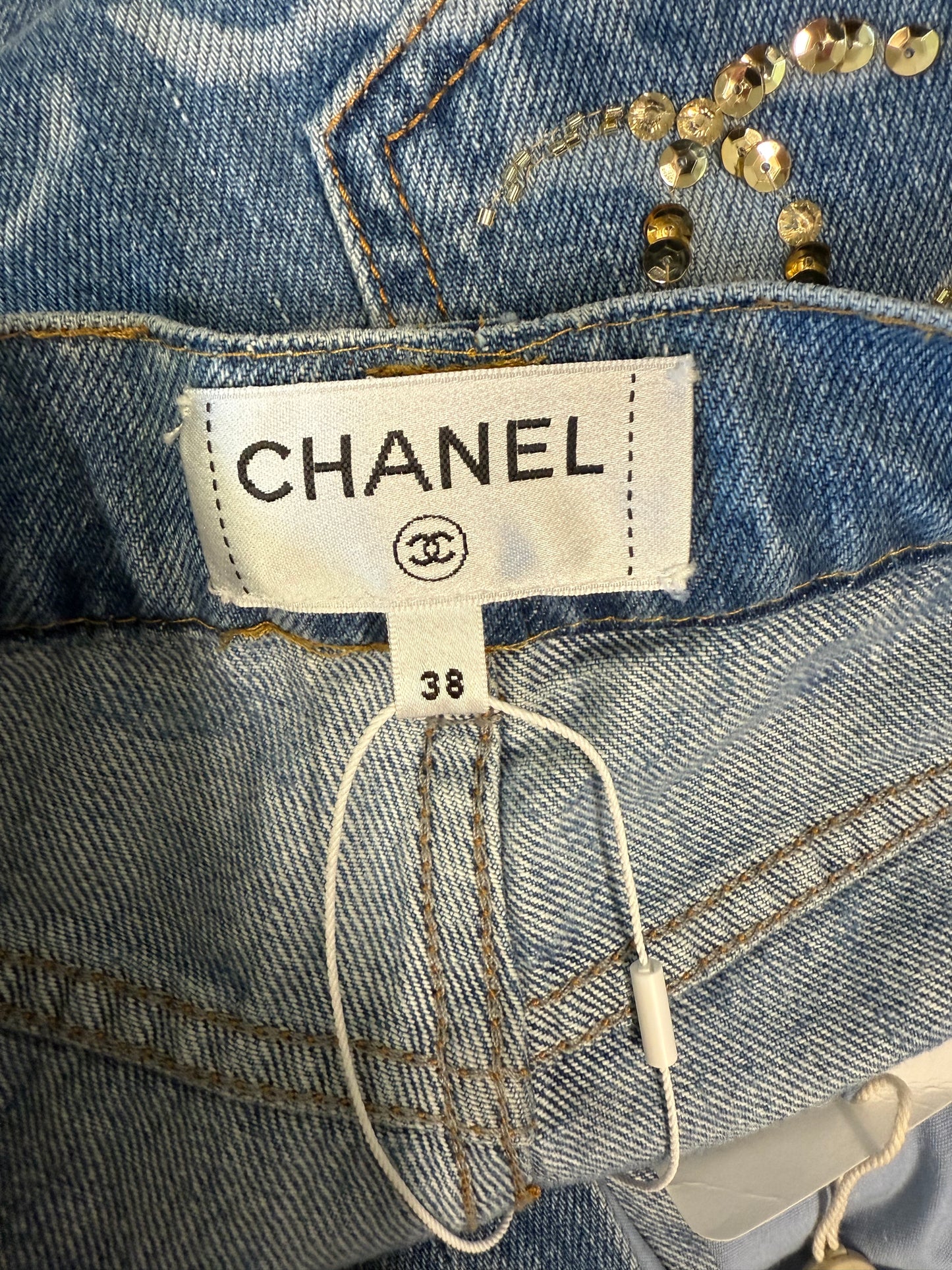 Chanel CC Printed logo denim jeans (pre-owned)