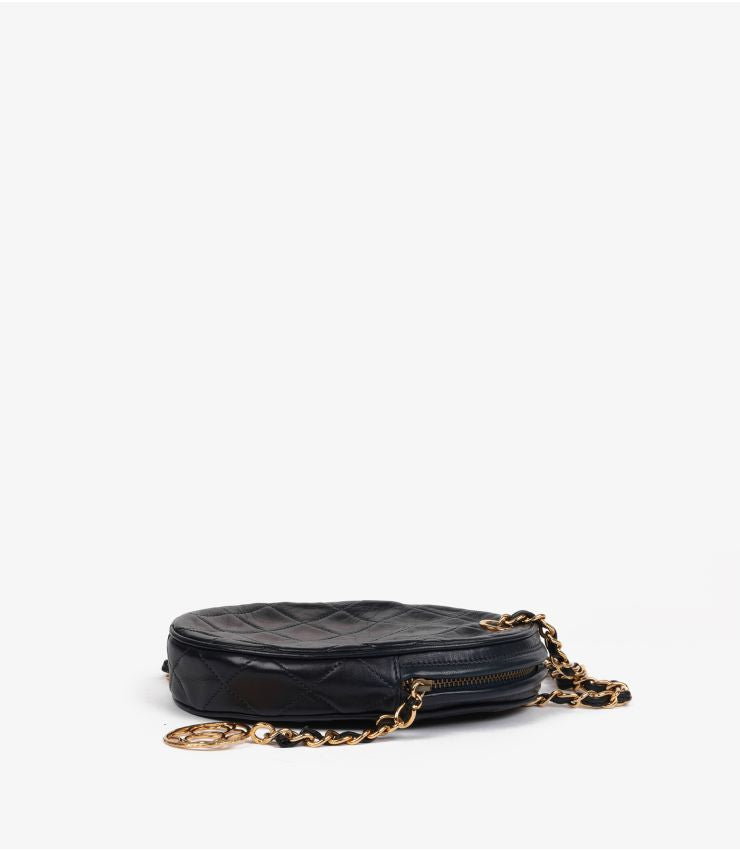 Chanel Navy Quilted Lambskin Vintage North-South Mini Oval Timeless Shoulder Bag (pre-owned)