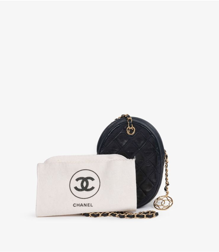 Chanel Navy Quilted Lambskin Vintage North-South Mini Oval Timeless Shoulder Bag (pre-owned)