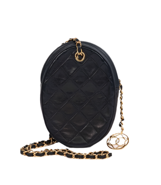 Chanel Navy Quilted Lambskin Vintage North-South Mini Oval Timeless Shoulder Bag (pre-owned)
