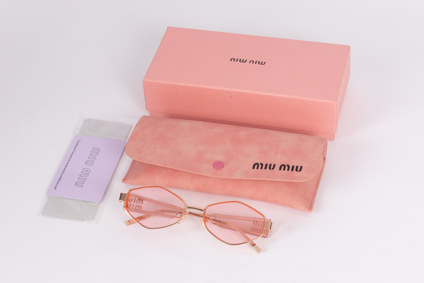 Miu Miu rose tinted sunglasses (pre-owned)