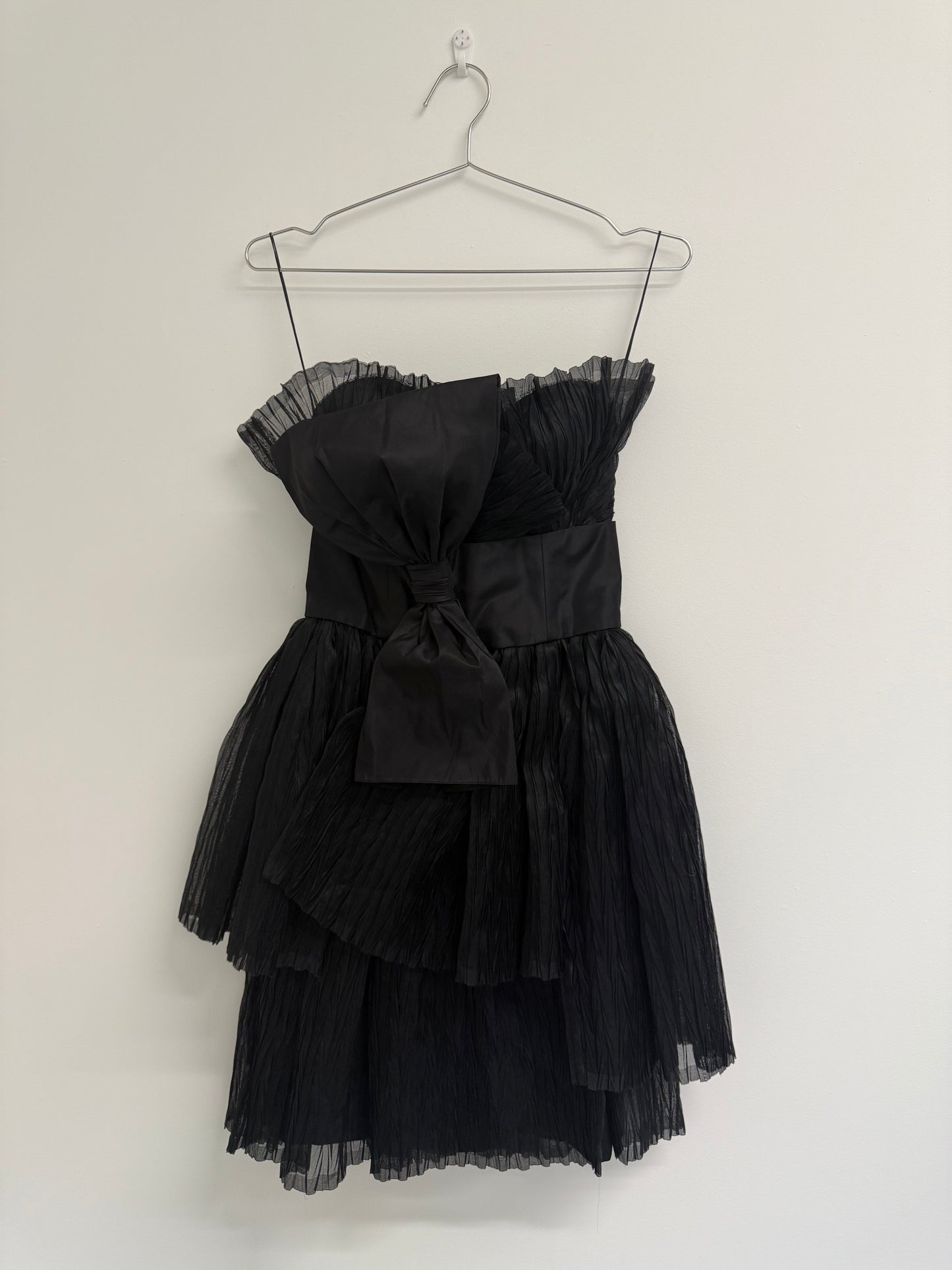 Marchesa Black pleated cocktail dress with bow (pre-owned)