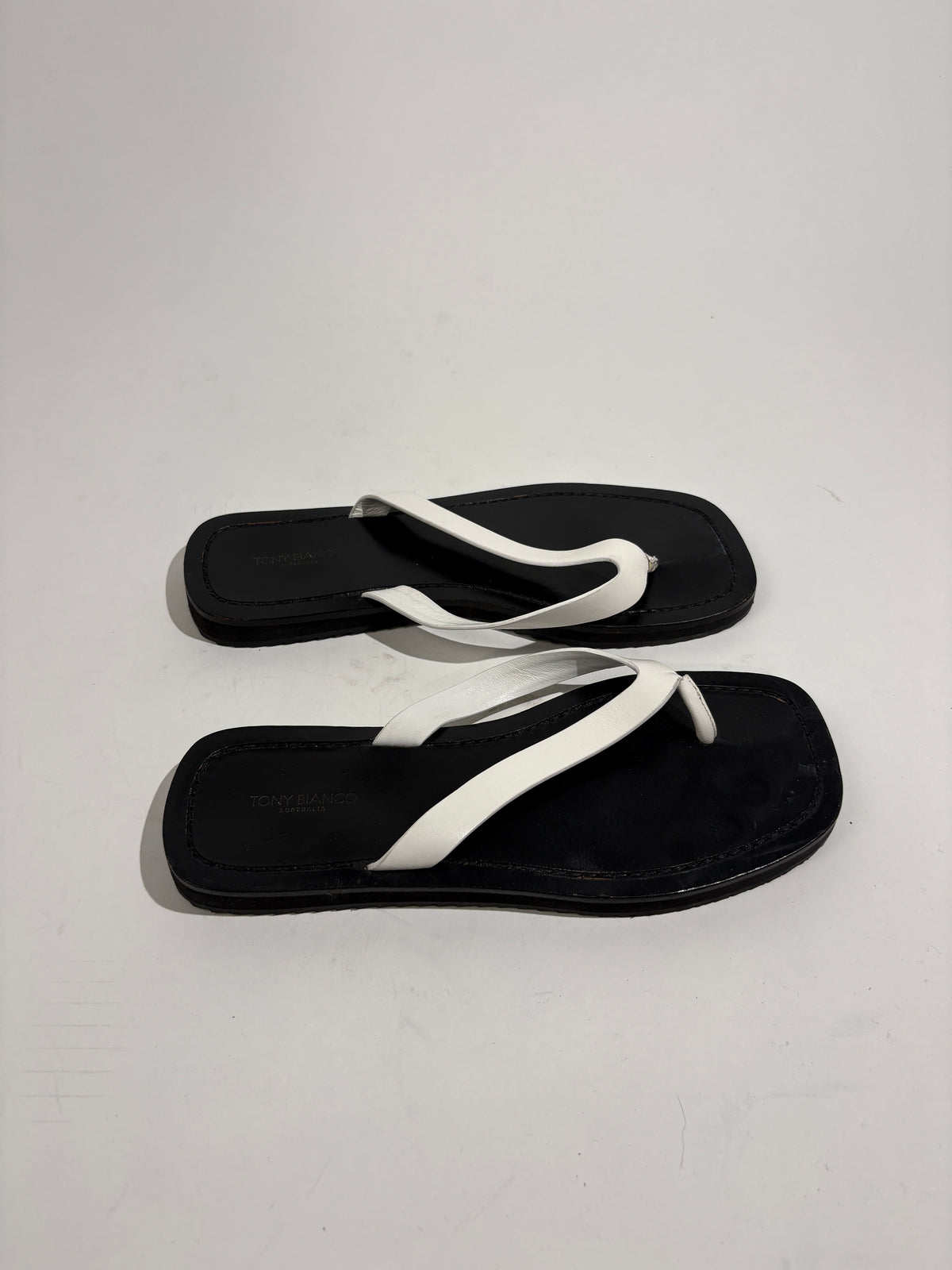 Tony Bianco Kimba White And Black Leather Flip Flops