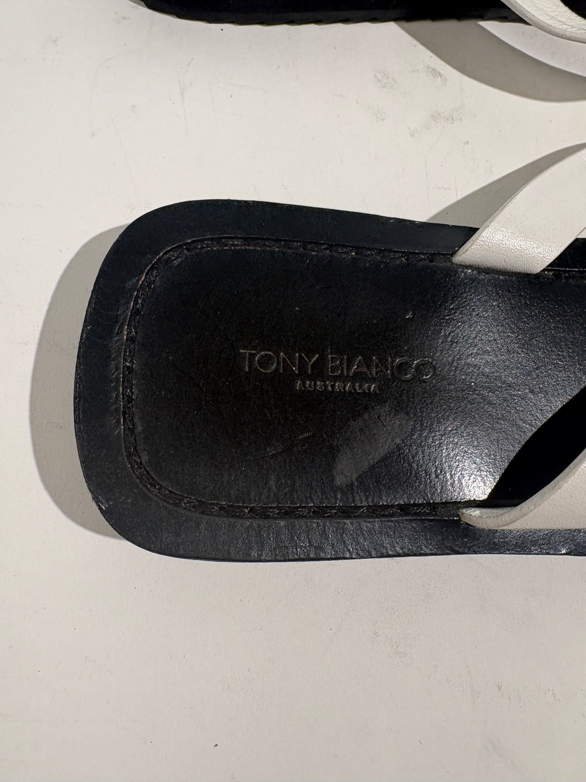 Tony Bianco Kimba White And Black Leather Flip Flops