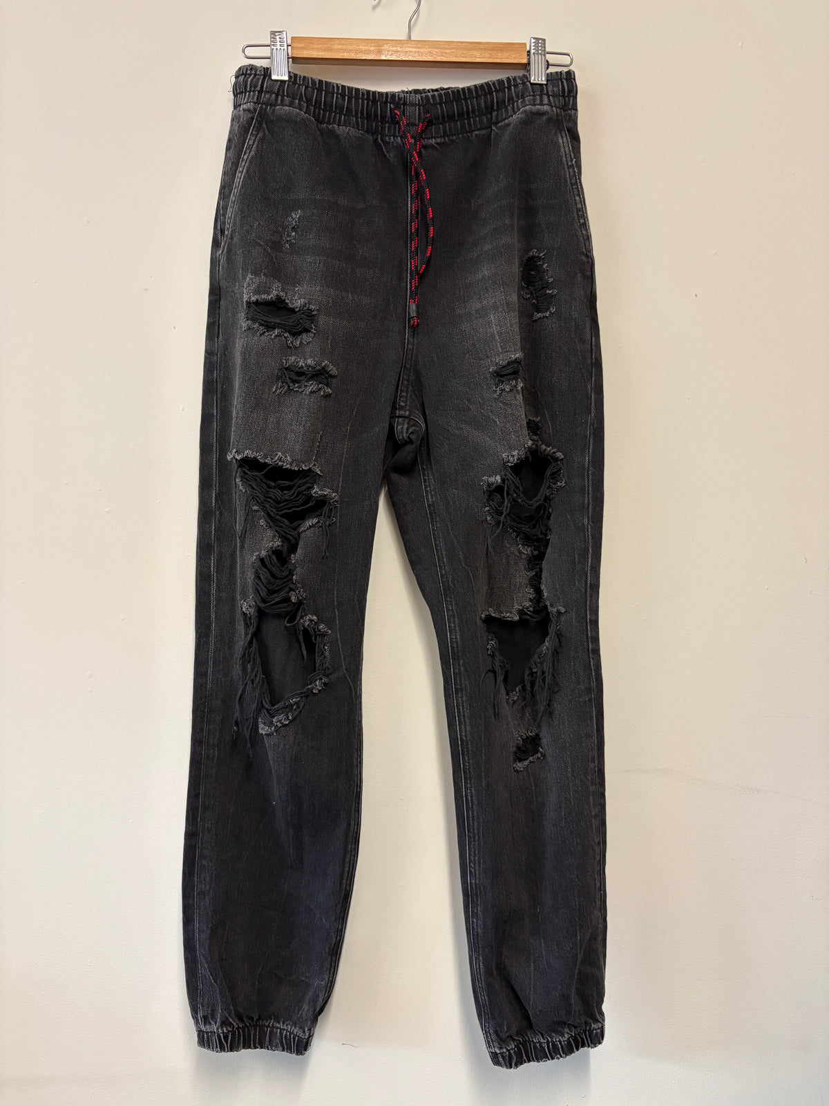 Alexander Wang black distressed jogger jeans