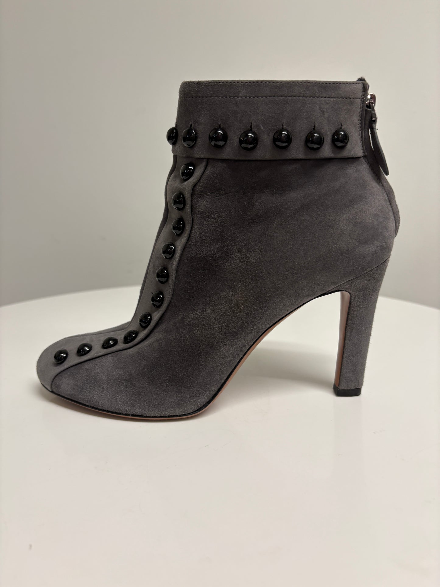 Alaia Grey Studded Suede Ankle Boots