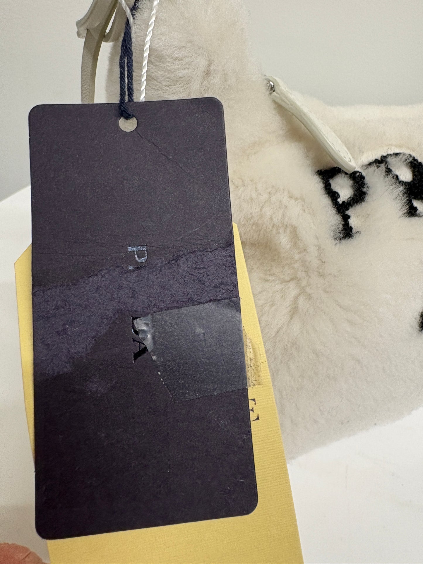 Prada Re-Edition 200 Cream Fur Bag