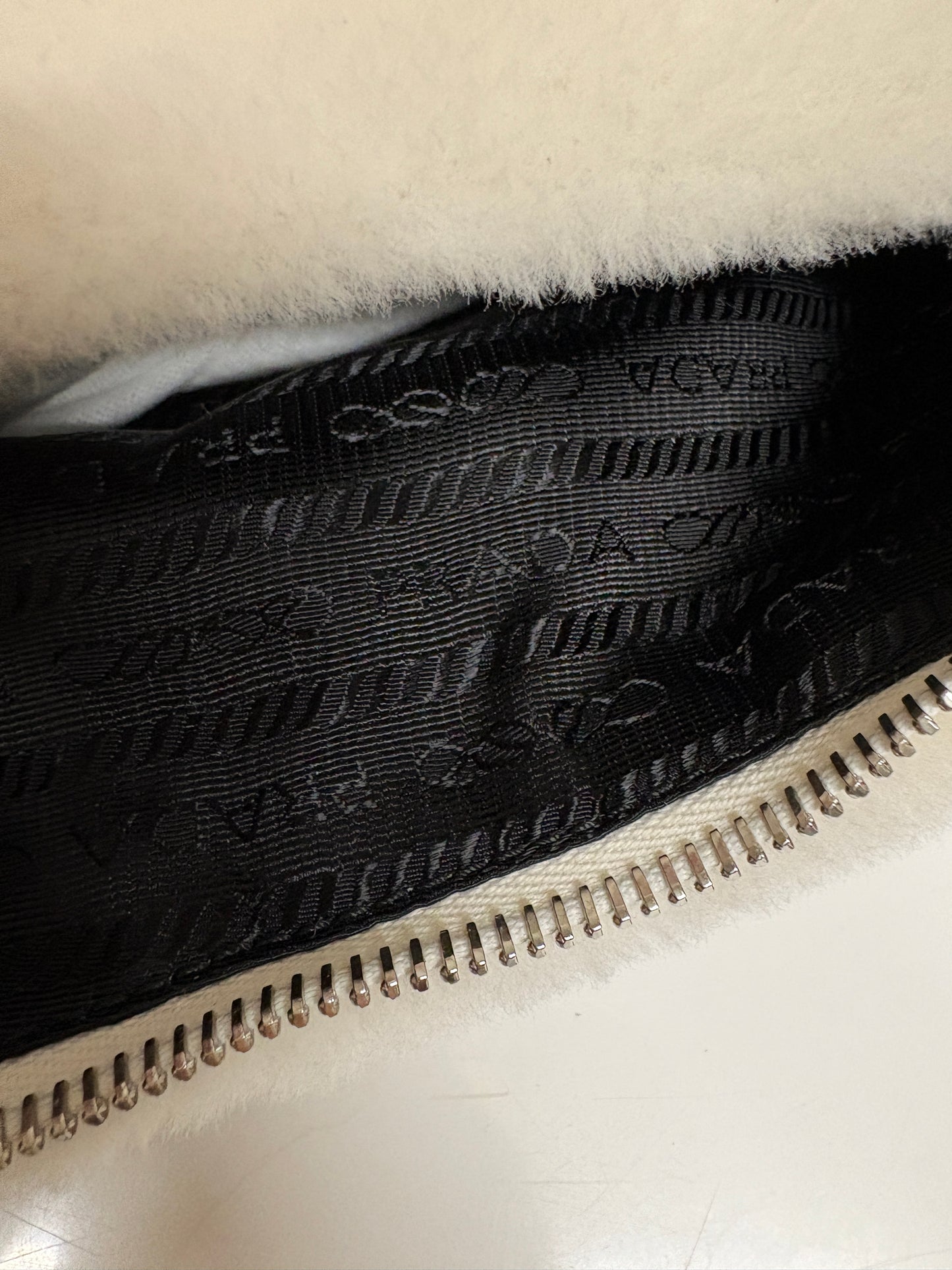 Prada Re-Edition 200 Cream Fur Bag